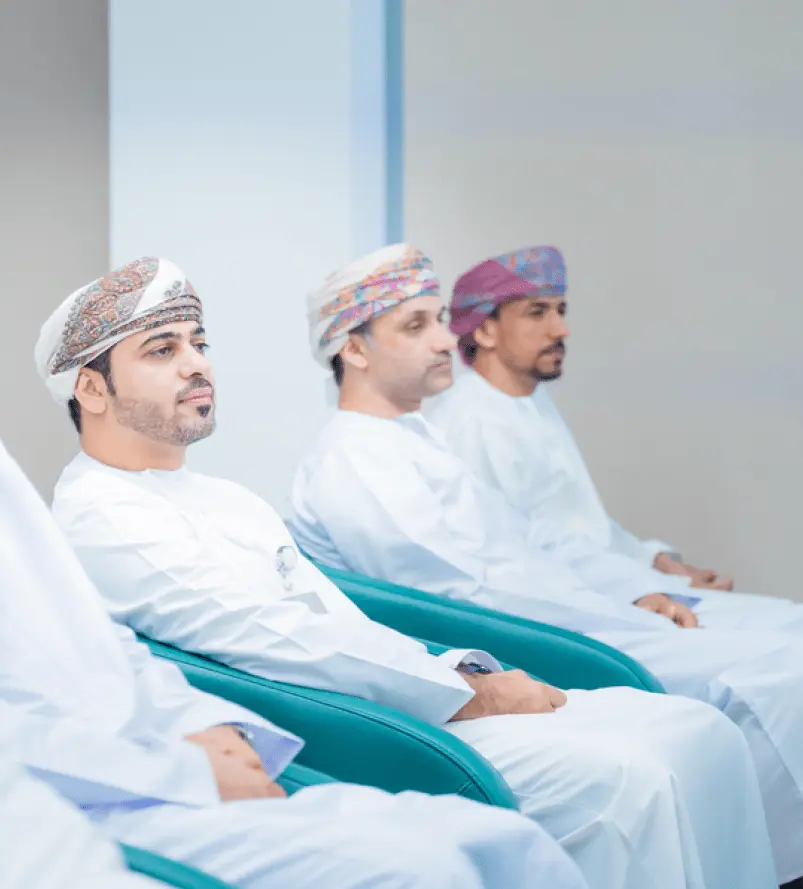 omani men in business meeting